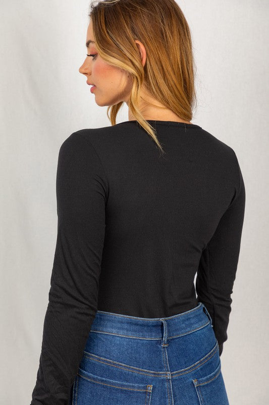 Load image into Gallery viewer, Glow Fashion Boutique black long sleeve v-neck bodysuit
